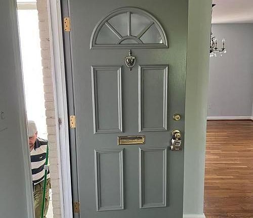 middle floor - front door - view of dining room and entrance from living room