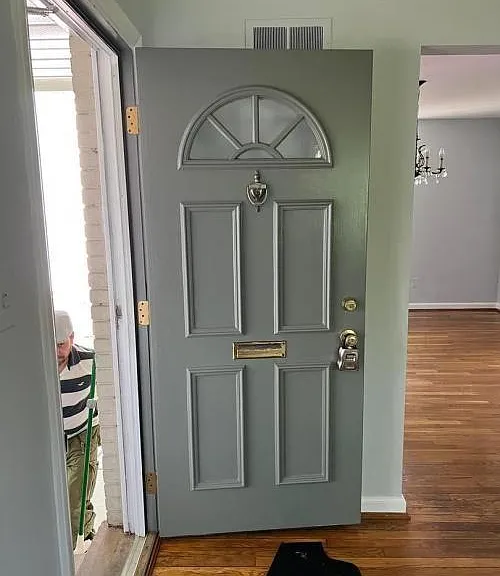 middle floor - front door - view of dining room and entrance from living room
