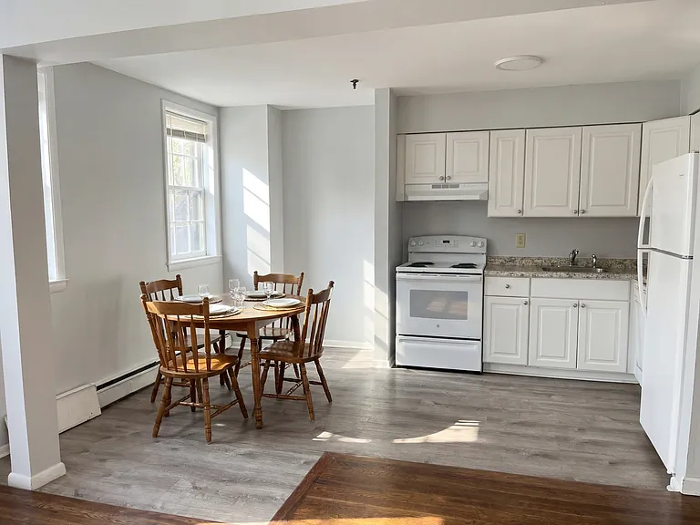 Eat in kitchen - Dining set is virtually staged.