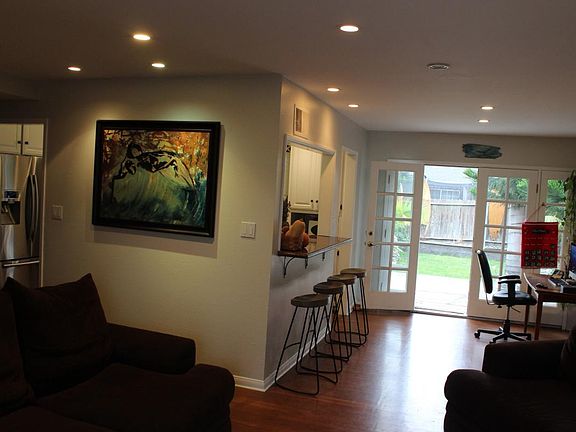 living room looking out french doors into backyard