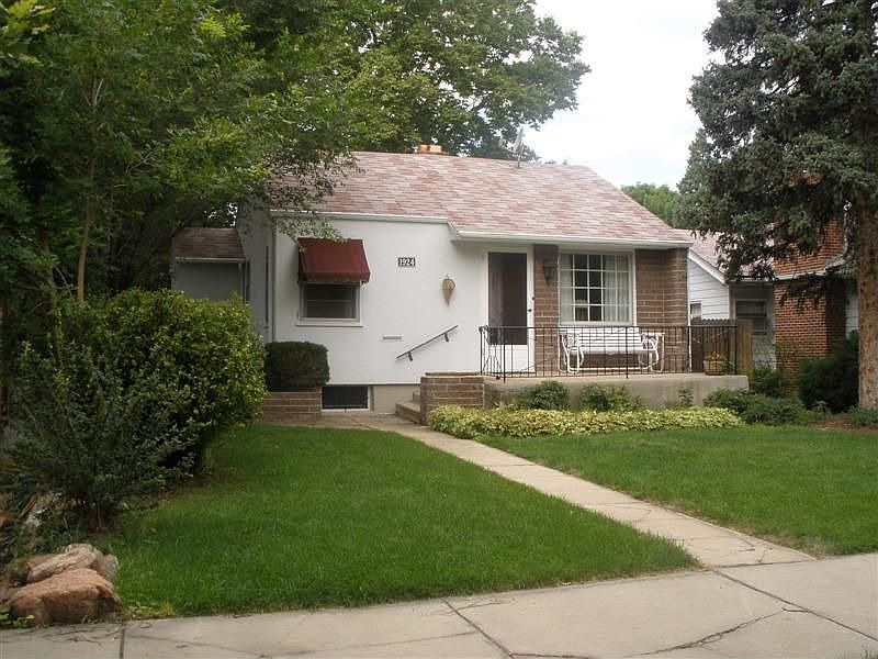 Front view with manicured lawn