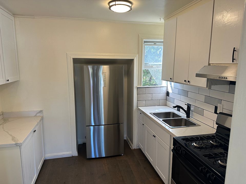 New oven and refrigerator. Plenty of countertop space and storage for kitchen items.