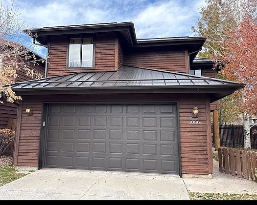 Snow Guards & Gutters prevent roof snow-melt & rain from reaching the driveway, deck and walk areas