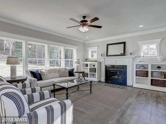 Family Room with Built Ins flanking the Fireplace.