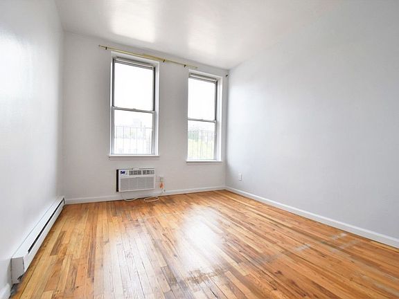 5th image of 310 W 4th St APT 13