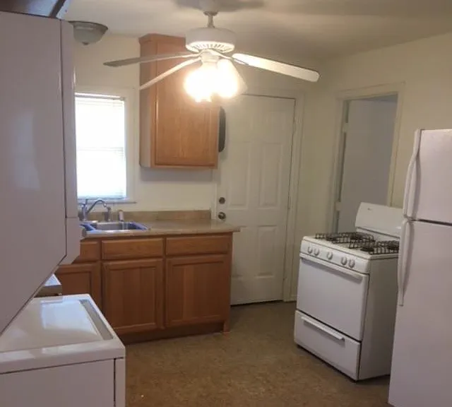 Fridge and stove included.