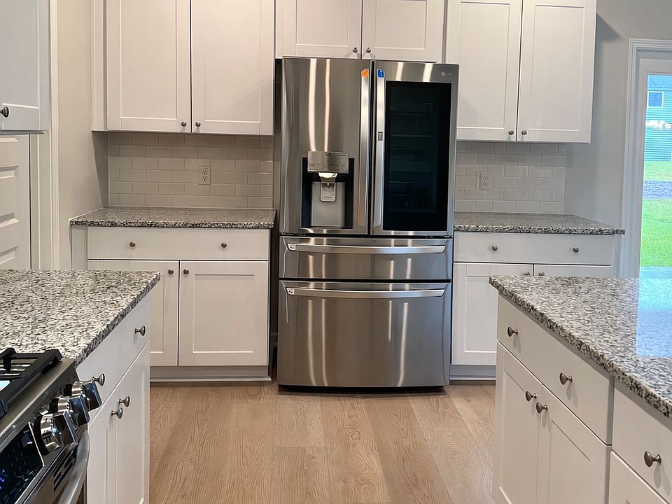 French door, counter depth refrigerator with dual ice maker in stainless steel finish.