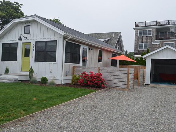 front and side patio area with garage