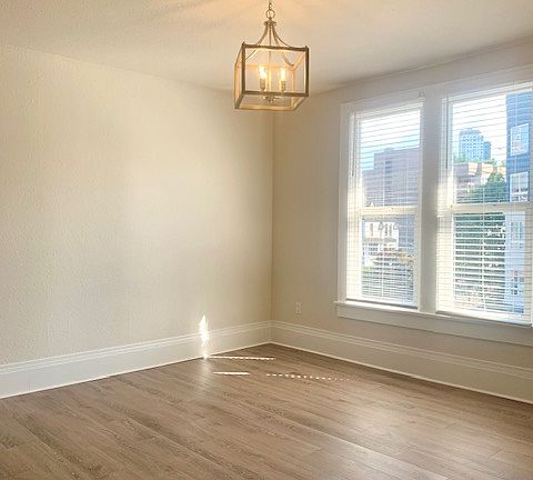 Beautiful living room with natural light from South facing windows.