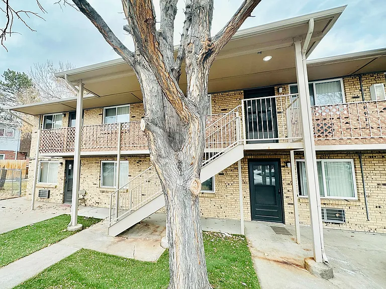 Welcome to your new home! This charming apartment offers a warm brick exterior and spacious balconies.