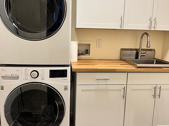 Laundry with Cabinets, Stainless steel sink & Pantry Area
