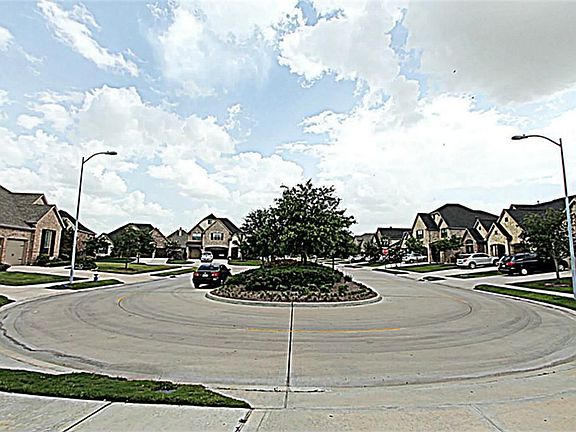 THIS HOME SITS ON AN UNIQUE STREET LOCATION WITH AN EXTENDED ESPLANADE