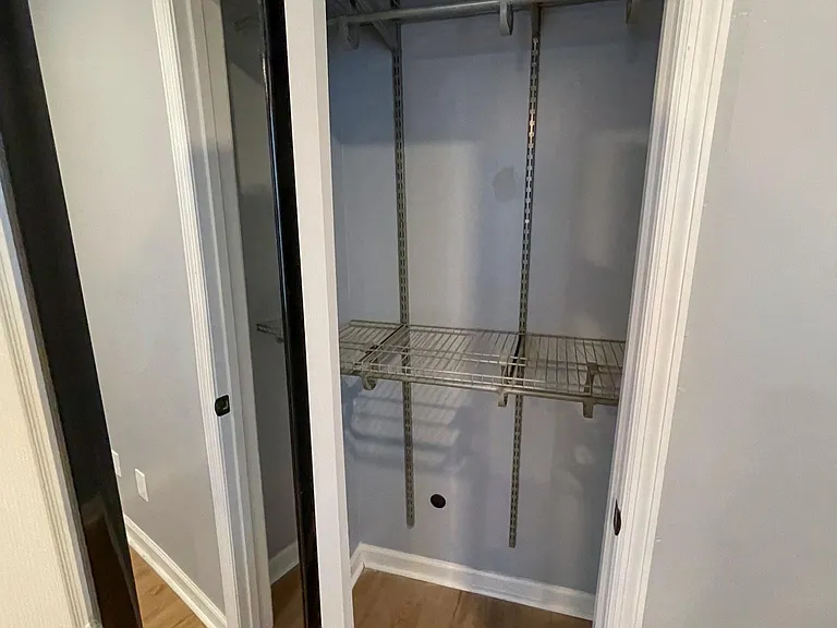 Custom shelving in primary bedroom