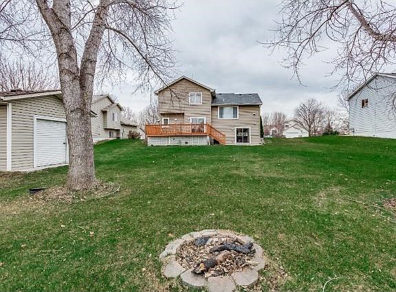 spacious back yard with fire pit
