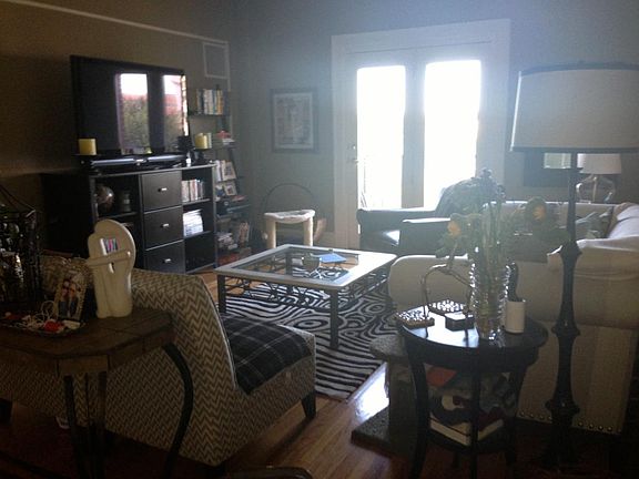 Living room with access to balcony over looking Mt. Pleasant
