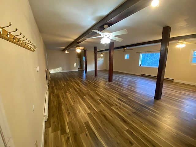 Large main room with new floors.