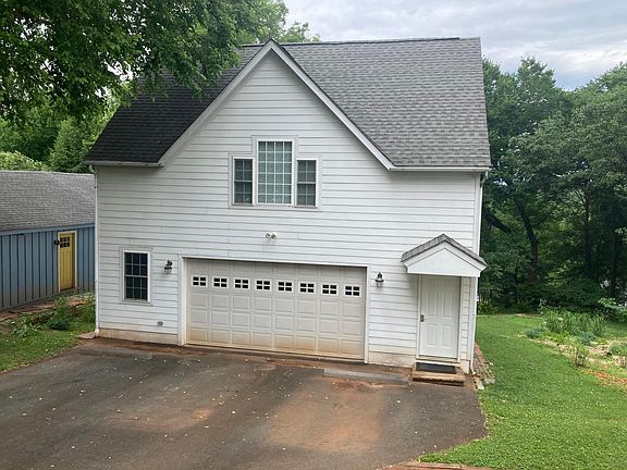 Carriage House with upstairs apartment. Parking space in driveway.