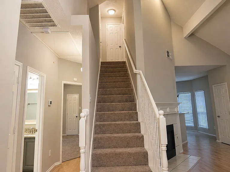 Stairs to private master suite