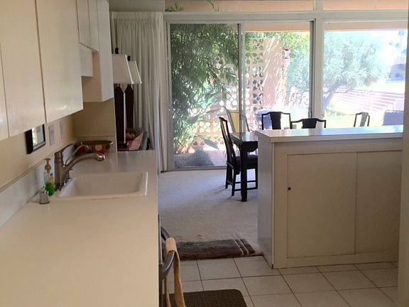 kitchen open to dining/views