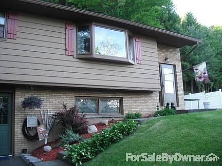Updated kitchen with new floor/subfloor
						:
						updated everything in kitchen, pocket door, breakfast bar with storage