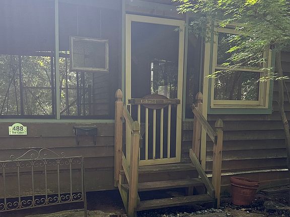 Screened porch, newly painted. New walkway. Private.