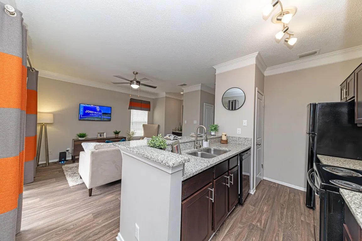 Kitchen with granite counters and modern cabinetry