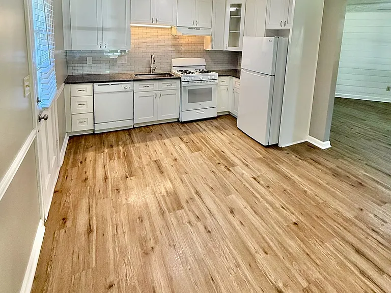 Seamless open layout_ - connects kitchen to living area for effortless entertaining and family time - gas range, dishwasher and ample storage simplify daily cooking for relaxed weeknight dinners