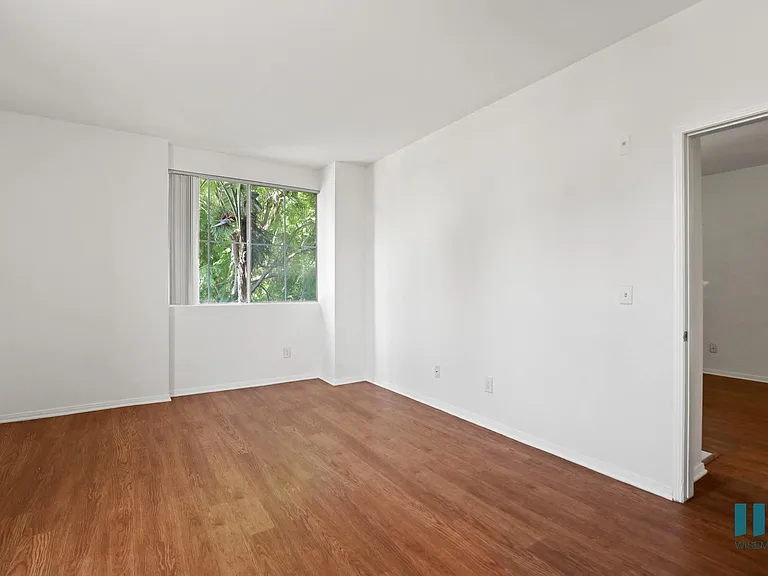 Bedroom with Windows and Vinyl Flooring
