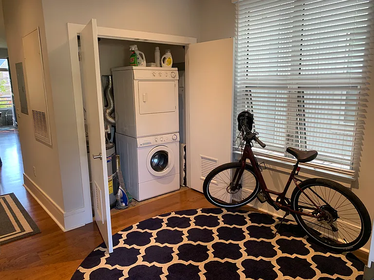 From the front door looking at the foyer/office and the washer/dryer closet