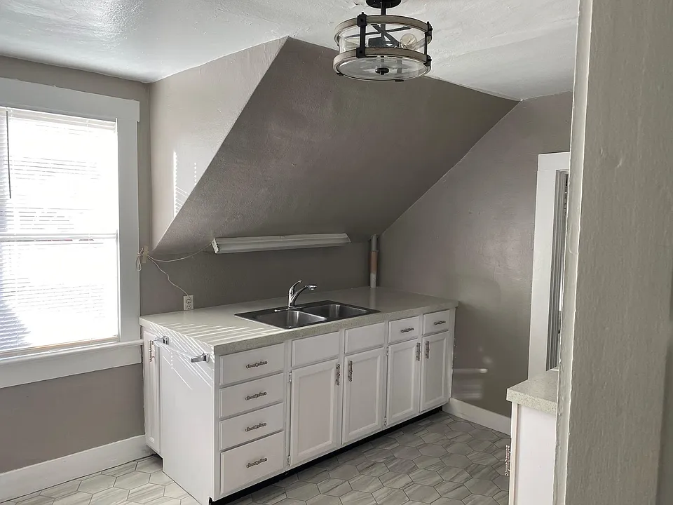Kitchen features updated Cabinetry