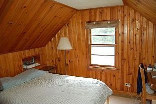 One of two 2nd floor bedrooms.