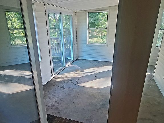 Sunroom with washer and dryer access