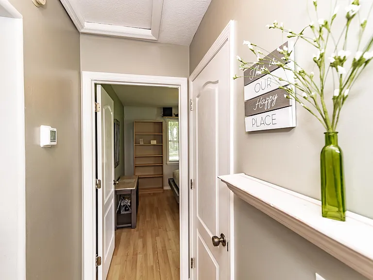 North wing hall. Two queen bedrooms and bathroom.