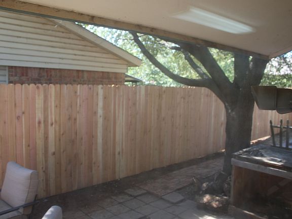 Back yard view - NEW FENCE has been installed for the entire property in late 