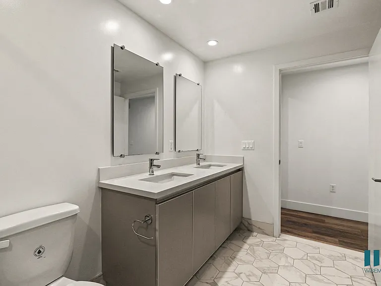 Bathroom with Double-Sink and Vanity Cabinet Storage