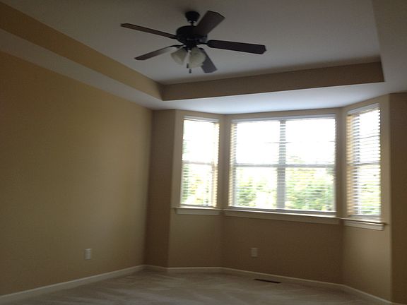 Master Bedroom With Trey Ceiling and Sitting area