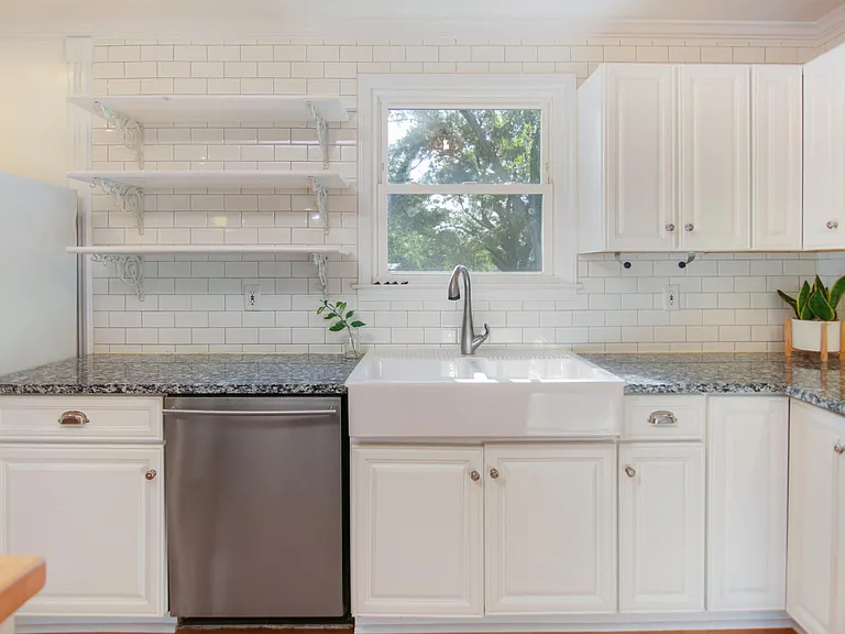 Farmhouse sink and Granite countertops