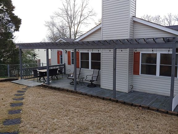 Back deck with pergola.