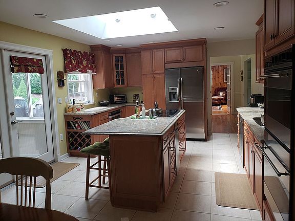 Granite, compactor in island