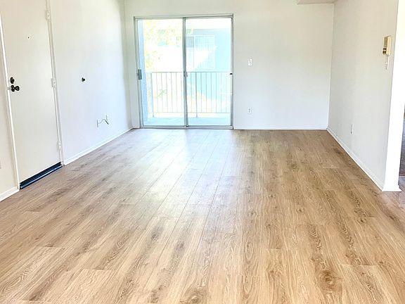 Living Room with brand new luxury vinyl tile flooring!