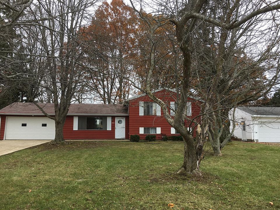 Clean Look Curb Appeal w/several Shade Trees!