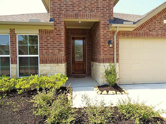 Built by Meritage in 2012.  It is a combination of brick & Hardi-board siding. Notice the stone accent & covered front porch. It has not only DOUBLE PANED, DOUBLE HUNG LOW-E WINDOWS, but also has spray foam insulation making it VERY ENERGY EFFICIENT.