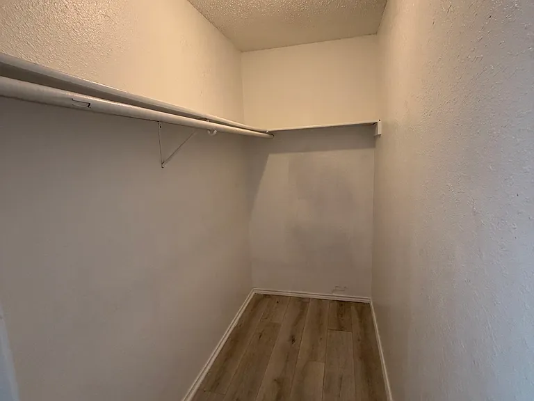 Bedroom #2 walk in closet with lighting