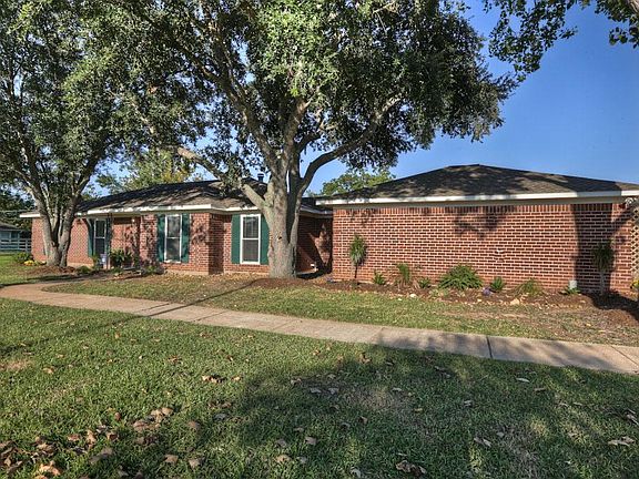 Long walkway to front door.