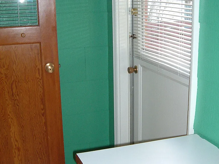 Utility Area and door on left to kitchen and door on right to the back deck.