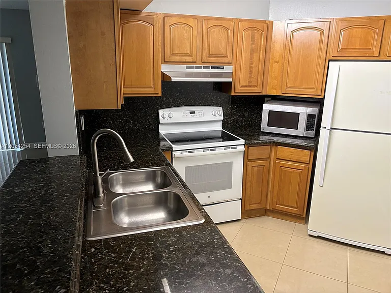 9711 Fontainebleau Blvd #D106 — Photo 9