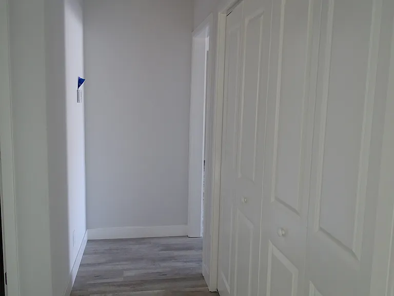 Dual Sliding closet doors for washer dryer hookups.