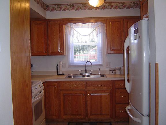Kitchen sink w/ backyard view