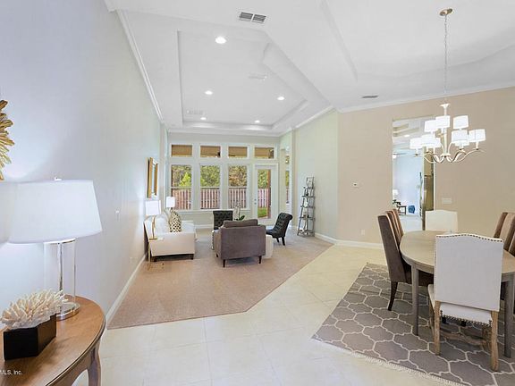 Foyer View of Dining/Living Rooms
