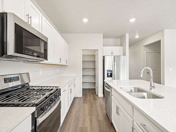 The Pine floorplan interior image taken at a Meritage Homes Community in Tooele, UT.